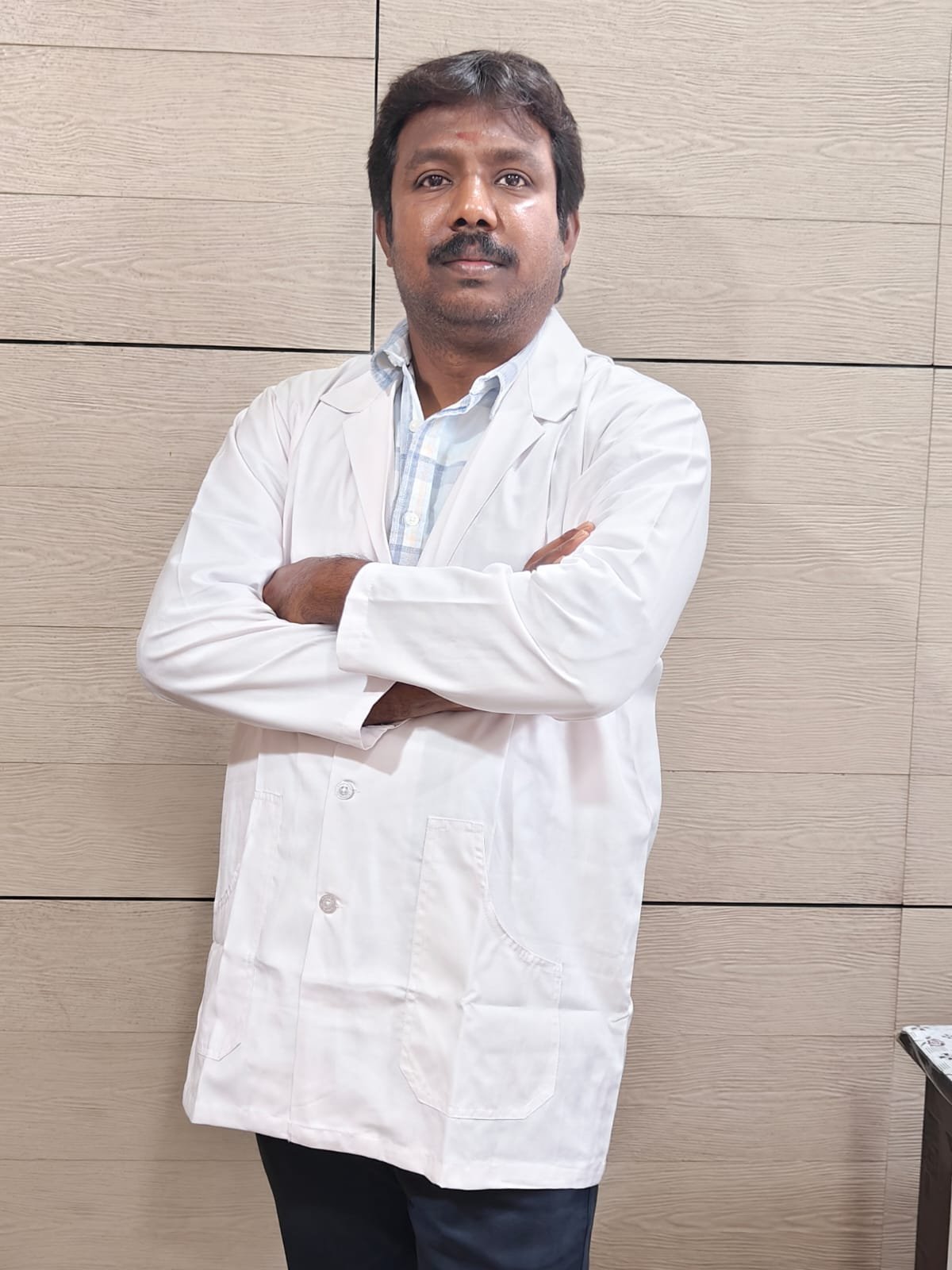 Dr. S. Shanmugasundaram, Surgical Oncologist